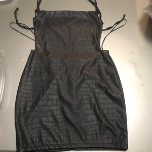 I am selling a black leather jumper dress !!!